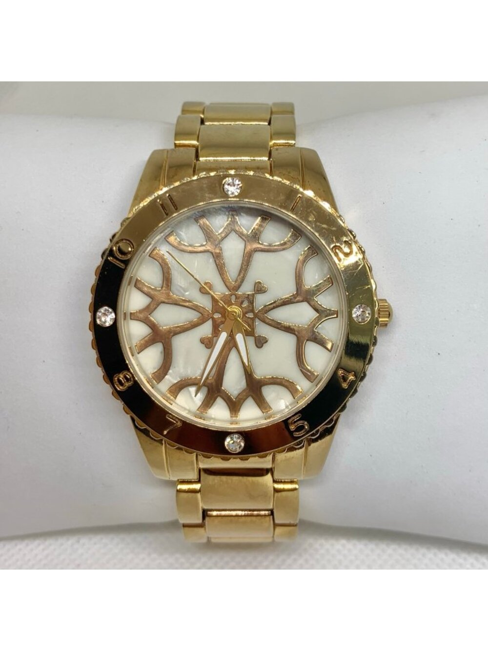 Women’s gold tone watch 38mm round quartz analog mop dial size  7” running